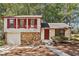 Ranch style home with stone accents and red shutters at 5035 Fairforest Dr, Stone Mountain, GA 30088