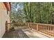 Wooden deck overlooking wooded backyard at 5035 Fairforest Dr, Stone Mountain, GA 30088
