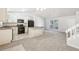 Modern kitchen with granite countertops and black appliances at 5035 Fairforest Dr, Stone Mountain, GA 30088