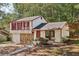 Ranch style home with stone accents and red shutters at 5035 Fairforest Dr, Stone Mountain, GA 30088