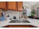 Modern kitchen sink and countertop with ample storage space at 204 Somerton Pl, Cumming, GA 30040