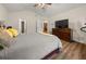 Primary bedroom with a king-size bed and built-in dresser at 204 Somerton Pl, Cumming, GA 30040
