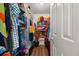 Walk in closet with ample shelving and hanging space at 204 Somerton Pl, Cumming, GA 30040