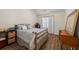 Guest bedroom with a double bed and wooden dresser at 204 Somerton Pl, Cumming, GA 30040