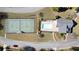 Aerial view showcasing pool, tennis court, and community at 204 Somerton Pl, Cumming, GA 30040