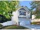 Two-story home with a two-car garage and a fenced backyard at 124 Silver Fox Trl, Dallas, GA 30157