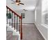 Spacious living room with neutral carpeting and ceiling fan at 124 Silver Fox Trl, Dallas, GA 30157