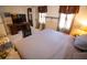 Spacious bedroom with a king-size bed and a desk at 244 Timber Creek Sw Ln, Marietta, GA 30060