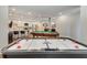 Basement game room with air hockey table and wet bar at 187 Fontaine Sw Rd, Mableton, GA 30126