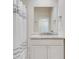 Simple bathroom with white vanity, shower, and neutral wall decor at 187 Fontaine Sw Rd, Mableton, GA 30126