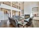 Open living room with double-height ceilings and hardwood floors at 187 Fontaine Sw Rd, Mableton, GA 30126