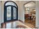 Grand entry featuring hardwood floors, ornate double doors, and views to dining room at 187 Fontaine Sw Rd, Mableton, GA 30126