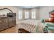 Spacious bedroom with hardwood floors and large windows at 187 Fontaine Sw Rd, Mableton, GA 30126