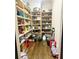 Large walk-in pantry with ample shelving for storage at 187 Fontaine Sw Rd, Mableton, GA 30126