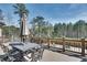 Deck features outdoor seating and wooded backdrop at 187 Fontaine Sw Rd, Mableton, GA 30126