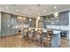 Island kitchen with gray cabinets and marble countertops at 187 Fontaine Sw Rd, Mableton, GA 30126