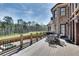 Spacious deck with wooded views and outdoor dining area at 187 Fontaine Sw Rd, Mableton, GA 30126