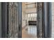 Elegant entry with two-story foyer, intricate door, and hardwood floors at 187 Fontaine Sw Rd, Mableton, GA 30126