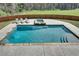 Inviting in-ground pool with spa and ample patio space at 187 Fontaine Sw Rd, Mableton, GA 30126