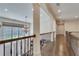 Bright hallway with hardwood floors, chandelier, and views to the backyard at 187 Fontaine Sw Rd, Mableton, GA 30126