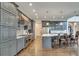 Spacious kitchen with gray cabinets and hardwood floors at 187 Fontaine Sw Rd, Mableton, GA 30126