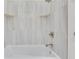 Clean bathroom with a bathtub and updated tile shower at 187 Fontaine Sw Rd, Mableton, GA 30126