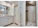 Modern bathroom with white vanity and a glass shower at 187 Fontaine Sw Rd, Mableton, GA 30126