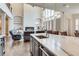 Kitchen boasts a large island, stainless steel appliances, and marble countertops at 187 Fontaine Sw Rd, Mableton, GA 30126