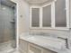 Spa-like bathroom with soaking tub and walk-in shower at 187 Fontaine Sw Rd, Mableton, GA 30126