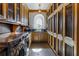 Laundry room with custom cabinetry and window at 2288 Peachtree Nw Rd # 6, Atlanta, GA 30305