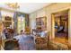 Bright sitting area with floral furniture and hardwood floors at 2288 Peachtree Nw Rd # 6, Atlanta, GA 30305