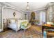 Elegant bedroom features ornate bed, sitting area and floral wallpaper at 2288 Peachtree Nw Rd # 6, Atlanta, GA 30305