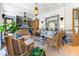 Relaxing sunroom boasts wicker furniture and blue and white tile at 2288 Peachtree Nw Rd # 6, Atlanta, GA 30305