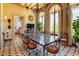 Bright dining room features a large marble table and access to a balcony at 2288 Peachtree Nw Rd # 6, Atlanta, GA 30305