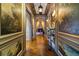 Grand hallway with ornate wood floors, wall art, and detailed millwork at 2288 Peachtree Nw Rd # 6, Atlanta, GA 30305
