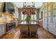 Gourmet kitchen features custom cabinetry, high-end appliances, and a large island at 2288 Peachtree Nw Rd # 6, Atlanta, GA 30305