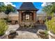 Outdoor dining area with ornate chairs and gazebo at 2288 Peachtree Nw Rd # 6, Atlanta, GA 30305