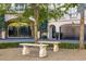 Stone benches in a tranquil courtyard setting with manicured hedges at 2288 Peachtree Nw Rd # 6, Atlanta, GA 30305