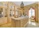 Large walk-in closet with marble island and mirrored doors at 2288 Peachtree Nw Rd # 6, Atlanta, GA 30305