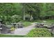 Relaxing patio seating area with wicker furniture and lush landscaping at 2288 Peachtree Nw Rd # 6, Atlanta, GA 30305