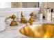 Elegant bathroom with gold fixtures and marble vanity at 2288 Peachtree Nw Rd # 6, Atlanta, GA 30305