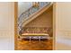 Grand curved staircase with ornate railing and bench at 2288 Peachtree Nw Rd # 6, Atlanta, GA 30305