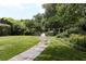 Landscaped grounds with stone path, seating areas, and lush greenery at 2288 Peachtree Nw Rd # 6, Atlanta, GA 30305