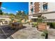 Stone patio with seating area and lush landscaping at 2288 Peachtree Nw Rd # 6, Atlanta, GA 30305