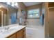 Clean bathroom with soaking tub, shower, and updated vanity at 304 Ridge Hill Cir, Canton, GA 30115