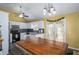 Kitchen with white cabinets, granite countertops, and stainless steel appliances at 304 Ridge Hill Cir, Canton, GA 30115