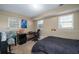 Finished basement bedroom with a double bed and workspace at 304 Ridge Hill Cir, Canton, GA 30115