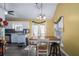 Eat-in kitchen with yellow walls, wood table, and french doors at 304 Ridge Hill Cir, Canton, GA 30115