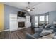 Spacious living room with a fireplace and built-in shelving at 304 Ridge Hill Cir, Canton, GA 30115