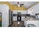 Bright kitchen with white cabinets and granite countertops at 304 Ridge Hill Cir, Canton, GA 30115